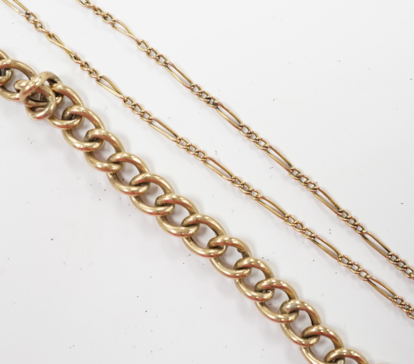 A 1970's 9ct gold curb link bracelet, with heart shaped padlock clasp, 18cm, together with a 9ct fine link chain, 10.3 grams. Fair condition.